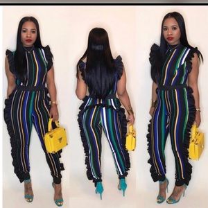 Multi colored jumpsuit ( Medium)